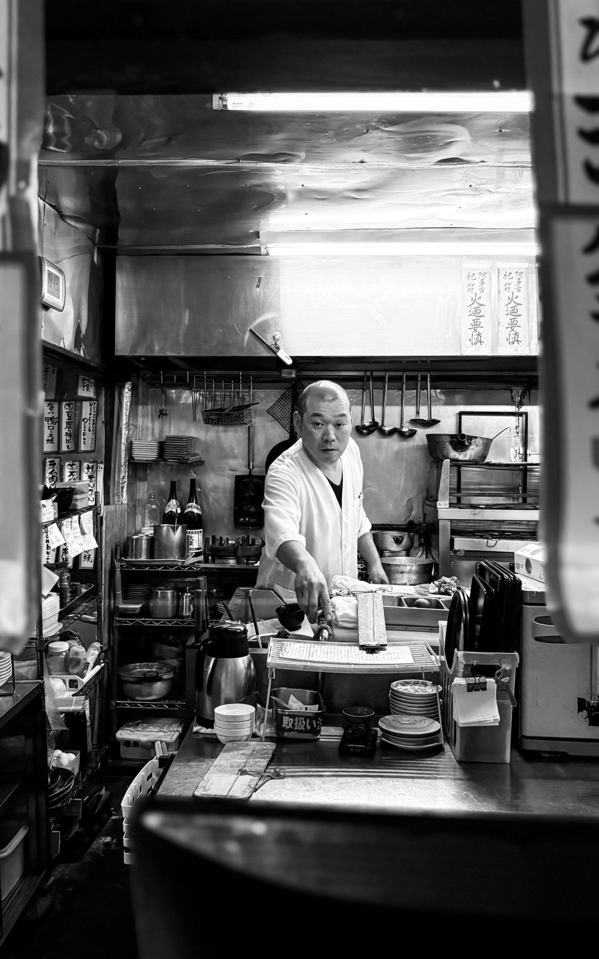 A chef at work in a small Tokyo kitchen